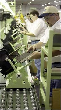 Workers staff the start of the assembly line at the Keihin Plant on Muncie’s north side. The plant has added employees to its 203-person workforce in the past few months and could add even more if it gets a contract to supply parts for Honda’s Greensburg plant. THE&#8200;STAR&#8200;PRESS FILE PHOTO