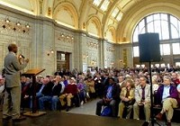 Derrick James, senior officer of government affairs with Amtrak, speaks at the Northeast Indiana Passenger Rail Association’s Rally for Rail on Friday at the historic Baker Street Station. Photo by Clint Keller | The Journal Gazette