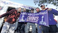 Party&rsquo;s not over: Ari Gorfain (from left), Evan Schlem, Jason Myerson, Dave Cappello and Steve Gentile celebrate the New York Giants&rsquo; Super Bowl win over the New England Patriots on Sunday. Schlem and his pals drove from New Haven, Conn., to a Greenfield hotel. Tom Russo / Daily Reporter