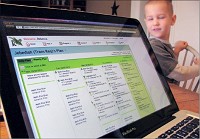 Just like a classroom: Jebediah Lottes&rsquo; kindergarten schedule is mapped out on a website run by Hoosier Academies, a charter school whose online classes now enroll 2,400 students statewide. Kristy Deer photo