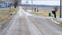 Off again, on again: County Road 300 North between 200 and 300 West is one of the broken roads in Clay County. The paved road had deteriorated to the point it had to be broken and returned to a gravel surface. Tribune-Star/Jim Avelis
