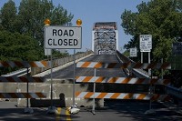 The bridge that spans the Wabash River and connects New Harmony, Ind., with White County, Ill., closed May 21. A team of engineers deemed the bridge too dangerous to remain open. DENNY SIMMONS / Evansville Courier &amp; Press