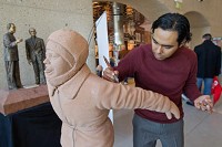 Sculptor Oscar Leon from Timeless Creations of Highwood Illinois works on the Flick statue during the Southshore CVA explore the South Shore event held at the Indiana Welcome Center in Hammond on Saturday January 26, 2013. | Charles Mitchell~for Sun-Times Media