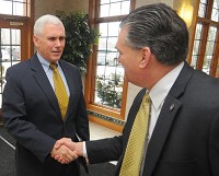 Indiana governor Mike Pence is greeted by Terre Haute Chamber of Commerce President and CEO Ken Brengle at the Idle Creek Banquet Center Thursday afternoon. Tribune-Star photo by Jim Avelis