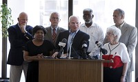 Former South Bend Mayor Joe Kernan, center, speaks Wednesday about the current state of the South Bebnd Common Council and its recent infighting at a news conference at the County-City Building in South Bend. (SBT photo/GREG SWIERCZ)