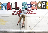 A wall in the alley next to Bernadette&rsquo;s Barbershop was Zach Medler&rsquo;s canvas last week in downtown Lafayette. (Photo: John Terhune/Journal &amp; Courier)