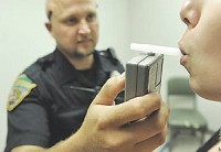 More drunken-driving suspects are refusing to take the standard breath test to analyze blood-alcohol content. That is helpimg to fuel an increase in the cost to gather that evidence. Staff photo by Tom Russo