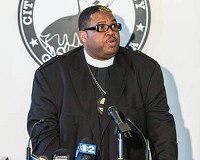 Bishop Norman Harrison talks about the need for more churches to get involved in the fight against crime in Gary on July 28, 2014. | Jim Karczewski/For Sun-Times Media