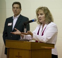 Indiana Superintendent of Public Instruction Glenda Ritz speaks at a luncheon for retired teachers Thursday at the American Baptist East Church in Evansville. Listening at left is EVSC School Board member and retired teacher Andrew Guarino. Staff photo by Kevin Swank