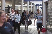 Travelers make their way through the South Bend International Airport. AAA expects more than 816,000 Hoosiers to travel over the Labor Day weekend. (SBT Photo/SANTIAGO FLORES)