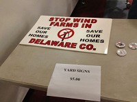 Yard signs and pins were used as opposition to new agriculture business in Delaware County. (Photo: The Star Press files )