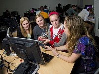 Students in the EPICS Learning Community program last fall evaluate sample materials for parts of a prosthetic leg. The students are, from left, Hailey Smith, Kelsey Wasilczuk, Jennie Boehm and Jessica Place. (Purdue University photo)