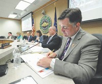 Rep. Luke Messer, R-Ind., takes notes during the hearing. The committee leadership decided to hold the field hearing in the freshman lawmaker%u2019s district. (Tom Russo / Daily Reporter)