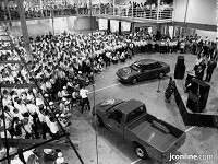 September 1989. Subaru-Isuzu Automotive employees gathered in the Lafayette plant to celebrate the first Subaru car and Isuzu pickup to roll off the line.&nbsp;(Photo: Journal &amp; Courier archives)