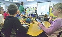 Southern Hancock elementary school students already have access to computers during the school day. If the district can get its eLearning program up and running, all students would be able to take the devices home. (File photo)