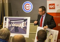 Joe Hart, president of the South Bend Cubs, displays a rendering of the locker room renovations planned. (SBT Photo/ROBERT FRANKLIN)