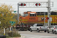 A train passes through the intersection of Sunnyside Avenue between U.S. 33 and Wilden Avenue Thursday in Dunlap. Elkhart County police ticketed Norfolk Southern trains 18 times recently for blocking the intersection for several hours. Staff photo by Sam Householder