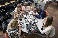 A group of students work with computer parts Oct. 2 during their CompTIA A+ certification class at the South Bend Career Academy in South Bend. Several employers cited the school as one of the local programs they feel will help increase the number of skilled workers. SBT Photo/ROBERT FRANKLIN