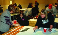 Residents turned out Saturday morning to help take part in painting a mural that will honor the city of Shelbyville.