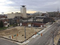 A cleared vacant lot will be the site of the new Gateway Park at the southwest corner of Madison and Main streets. The city of Muncie received a Ball Brothers Foundation grant of $63,000 to install sidewalks, landscaping and lighting for the park. (Photo: Corey Ohlenkamp/The Star Press )