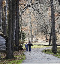 MITCHELL &mdash; Melinda McClare and Ben Haines enjoy the warm weather at Spring Mill State Park Monday afternoon. Staff photo by Garet Cobb