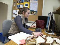  Catherine Labelle, shown working recently in a Beering Hall office at Purdue University, chose to add a global studies minor and take additional courses in supervision and organizational leadership. Consequently, she won&rsquo;t graduate in four years. (Photo: Michael Heinz/Journal &amp; Courier )