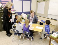 State Superintendent of Public Instruction Glenda Ritz visits Danielle Castor's classroom during a visit to the Southview Preschool Center in Anderson on Thursday. Staff photo by Don Knight