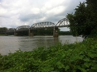 The member Posey County Commission voted to accept ownership of the New Harmony Bridge span that crosses the Wabash River, linking Illinois 14 in White County, Illinois, with Indiana 66 in Posey County on Tuesday, August 19, 2014.The bridge closed in May 2012 after an inspection claimed the bridge was unsafe. The hope is Posey County can make the repairs and re-open the bridge in the future. Staff file photo by Denny SImmons