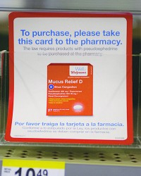 More behind the counter than over: In order to purchase medication that contains pseudoephedrine at pharmacies like Walgreens, a customer must present a card to the pharmacist to make a purchase. Staff photo by Joseph C. Garza
