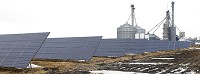 Tom McKinney has 12 30-foot solar arrays on his property in Tipton County. He's not in support of proposed legislation to change how solar energy producers are credited. Tim Bath | Kokomo Tribune