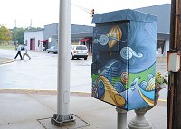 A painted utility box is pictured at the corner of Spring and Market Streets in downtown Jeffersonville in this file photo. More are planned for 2015, along with more than a dozen other art projects.