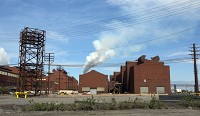 This building is where the basic oxygen furnaces are housed at ArcelorMittal Burns Harbor. ArcelorMittal lost $1.1 billion last year. Staff photo by John Luke