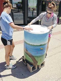 &ldquo;Lake Life&rdquo; by Lisa Gulick was one of 18 hand-painted rain barrels placed in the downtown business district last year as part of the Kendallville Park and Recreation Department&rsquo;s and Main Street Business Association&rsquo;s Art on Main project. This year, the project will feature 20 painted park benches.