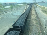 A train hauls coal in Gary. U.S. Steel is shuttering the coke-making plant, which bakes coal into the more purified coke for steelmaking, at its Gary Works steel mill.&nbsp; Staff photo by Joseph S. Pete