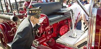 ORLEANS &mdash; Merrill St. John checks out the newly restored 1926 Peter Pirsch fire truck the town of Orleans bought new for $6,500 in 1928. Staff photo by Rich Janzaruk II