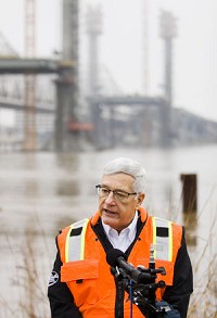 Max Rowland, communications project manager with Walsh Construction, speaks during a press conference surrounding the progress of the Ohio River Bridges Project on the Louisville riverfront Wednesday morning. The expected completion date for the downtown crossing portion of the project is January of 2016. Staff photo by Christopher Fryer