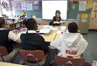 Stefanie Battista teaches her seventh-grade class at St. Stanislaus School in East Chicago. Staff photo by Eddie Quinones