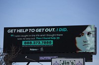 One of many human trafficking awareness ads is displayed on a digital billboard along North Ironwood Drive near Edison Road in South Bend. The billboard is one of 35 in Indiana displaying ads as part of an anti-human trafficking ad campaign.&nbsp;SBT Photo/SANTIAGO FLORES