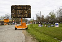 A sign for the Community Outreach Center, which currently houses the One-Stop Shop set up in response to the the recent HIV epidemic in Scott County, is pictured at the intersection of Frontage Road and West Main Street in Austin in this April 2015 file photo. Staff photo by Christopher Fryer