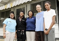 The Parran family, at their Anderson home, from left, Ja'Kyra Tilford, Ka'Neisha Tilford, Mileaka Parran, Anthony Parran and Joey Tilford. Staff photo by Don Knight