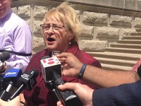 State Sen. Karen Tallian, D-Ogden Dunes, announces her bid for Indiana governor to reporters Tuesday, May 12, 2015 outside the Statehouse. Staff photo by Dan Carden