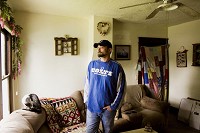 Brandon Terry, 31, is pictured at his home in Austin on Thursday afternoon. He has been battling drug addiction since he was 16, and is a participant in the Scott County needle-exchange program that was started in response to the recent HIV outbreak in the area. He is also currently taking steps to enter a rehabilitation program through the services offered at the One-Stop Shop in Austin. Staff photo by Christopher Fryer