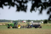 A farmer applies nitrogen to corn in northern Howard County on May 28, 2015. Kelly Lafferty Gerber | Kokomo Tribune
