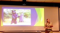 Kaitlin Rogers, an interpretive naturalist with Indiana Dunes State Park, gives a presentation on black bears Tuesday, June 30, 2015, at the nature center, in light of repeated spotting of one recently in the Michigan City area. (Amy Lavalley, Post-Tribune)