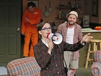 Rebecca Marowitz in the role of attorney Muriel Carlan with Jacob Gerard, background, in the role of an escaped convict and Martin Flowers, background right, in the role of Uncle Rick Deemer in Red Barn Summer Theatre's production of "Death By Golf" Tuesday, July14, 2015, in Frankfort. (Photo: John Terhune/Journal &amp; Courier)