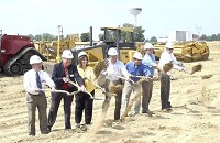 Breaking ground this morning for the new $10 million CSX Cross Dock, Warehouse Manufacturing facility east of Washington were (from left): Larry Ordner, representing Congressman Larry Buschon; Washington Mayor Joe Wellman, Brenda Goff, representing U.S. Sen. Dan Coats; Ind. Rep. Mike Braun, Tony Graber, president of Daviess County Economic Development Foundation; Ron Arnold, executive director of DCED and Daviess County Commissioner Tony Wichman. Staff photo by Kelly Overton