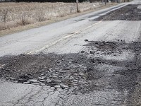 March was a particularly bad month for potholes in Delaware County, including along this stretch of Walnut Street north of Ind. 28. Highway crews from around East Central Indiana say they&rsquo;re still catching up on repairs. Photo: Jordan Kartholl/The Star Press