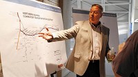 Kerry Keith of SEH speaks about the future possibilities for the South Shore line at a public forum hosted by NICTD officials on Thursday. (Suzanne Tennant/ Post Tribune)