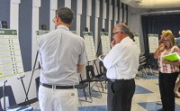 All mapped out: Citizens who attended the open house were invited to look over different sections of the plans and get any questions answered by the American Structurepoint team. Staff photo by Austen Leake