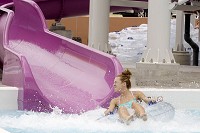 A visitor goes down a tube slide at River Run Family Waterpark recently.&nbsp;State Rep. Ed Clere warned Tuesday spending TIF dollars on projects such as the aquatic center could leave taxpayers "swimming in debt."&nbsp; Staff file photo